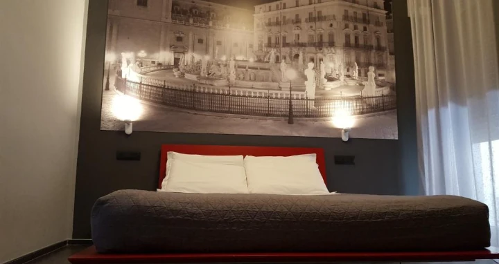 Bild vom Bett im Palermo Hotel Alma