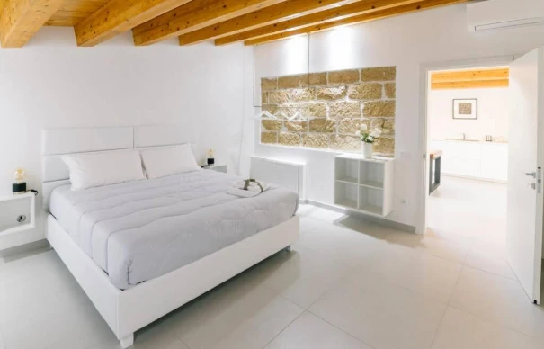 Bild vom Bett im Palermo Hotel Dolcevita Gold