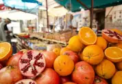 Bild von Orangen auf einem Markt in Palermo